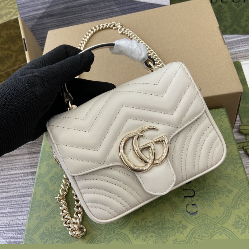G*u*i top handle bags